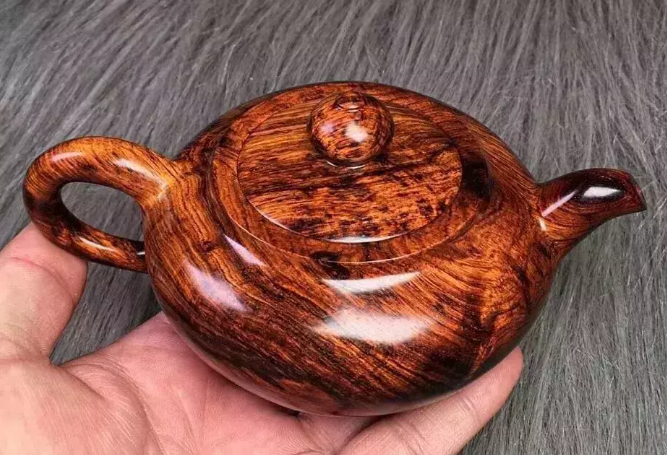 木壶泡茶好不好？华纳公司，呈现木雕文化与茶艺文化的养生风采